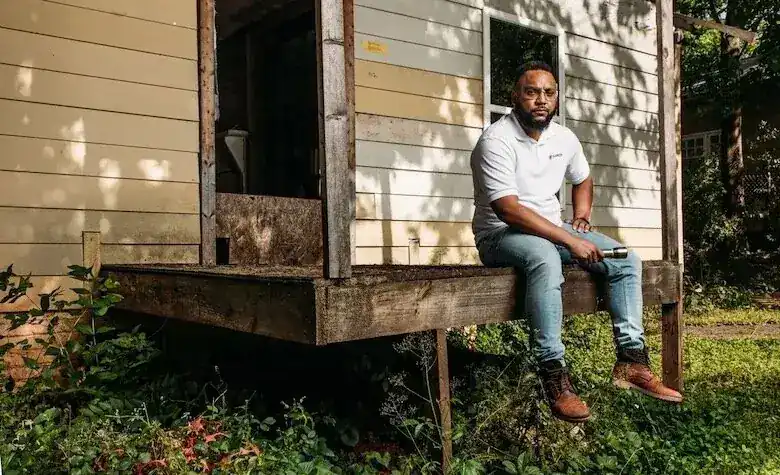 Duane Alexander in front of Atlanta property